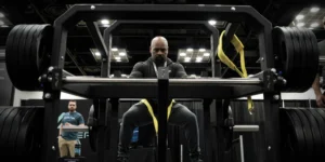 A man testing out the new ARMR plate-loaded machine from PLAE.